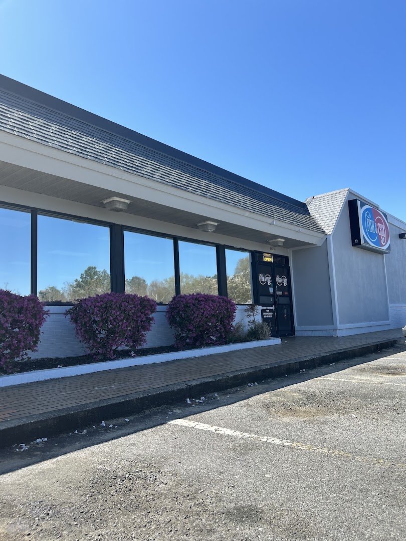 Counter service area with simple dining seating.